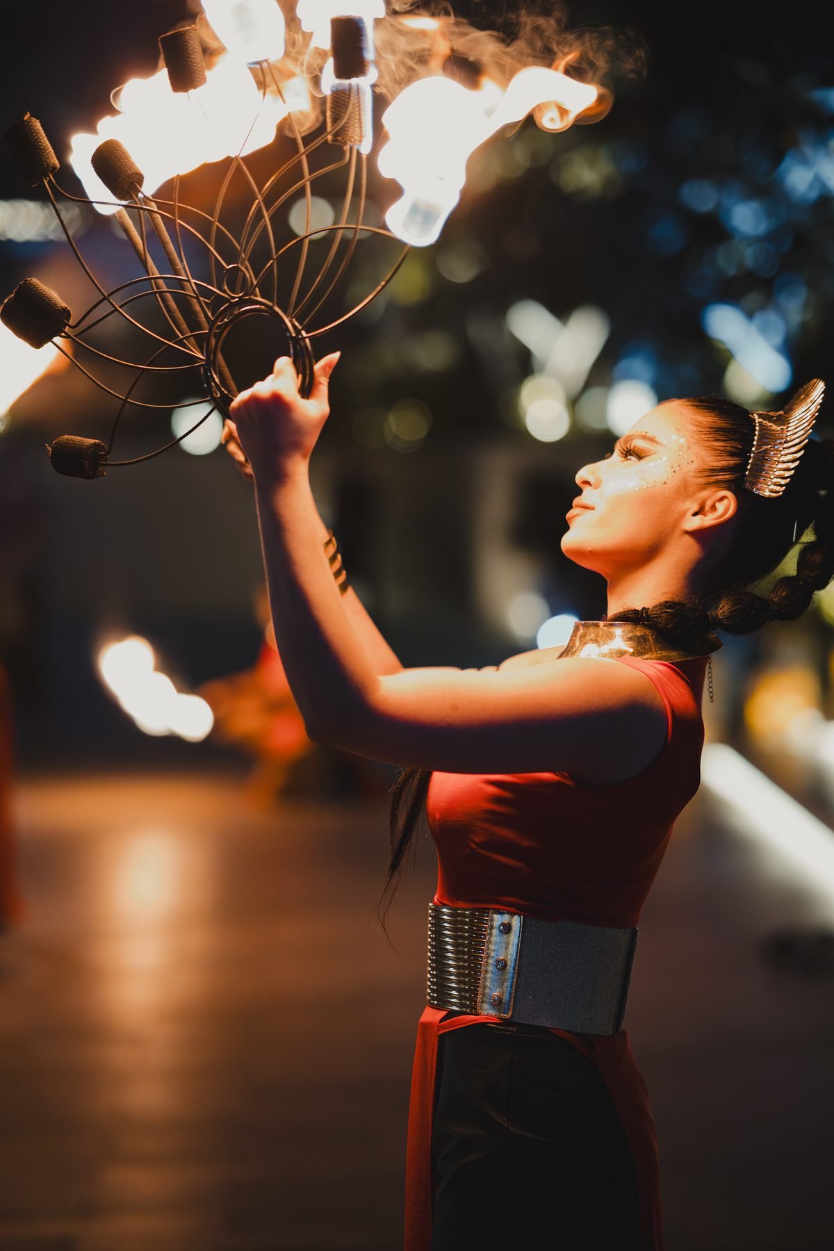 Fire performer at an evening event, filmed by Illumino Media